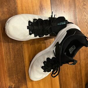 Under Armour HOVR Rise training shoes. Size 10.5. White/black w/ blue accents